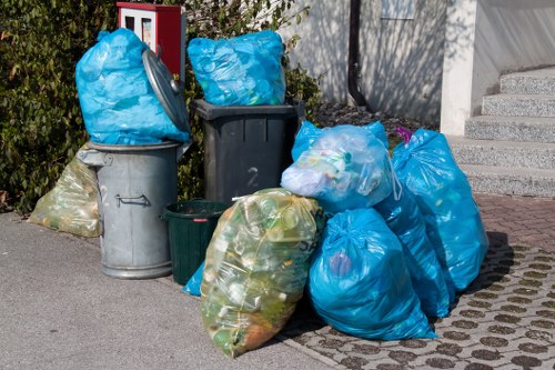 Workers segregating construction waste